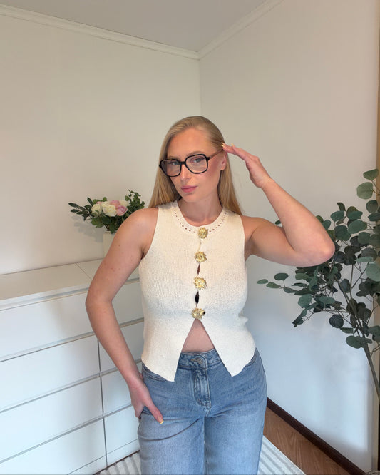 Top sans manches boutonné