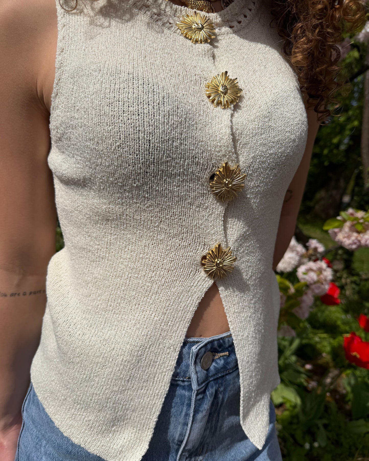 Top sans manches boutonné